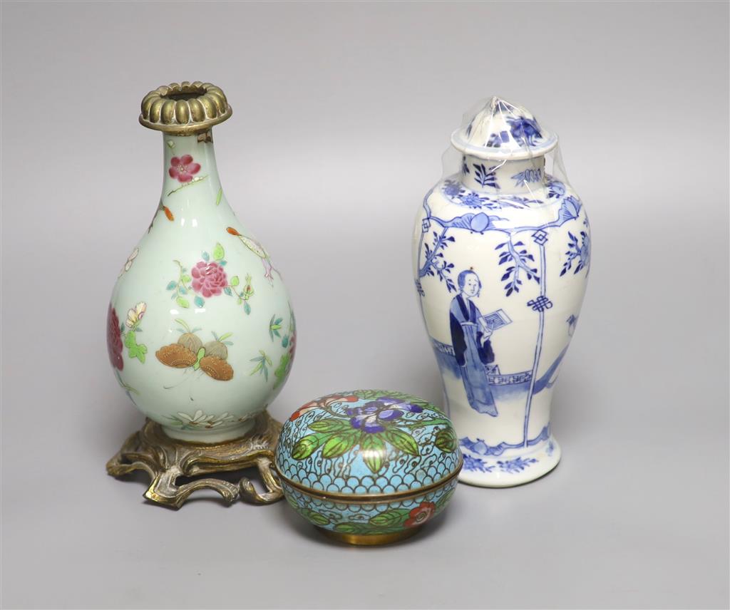 A 19th century Chinese famille rose and ormolu mounted vase, a blue and white vase and a cloisonne enamel box and cover, tallest 21cm
